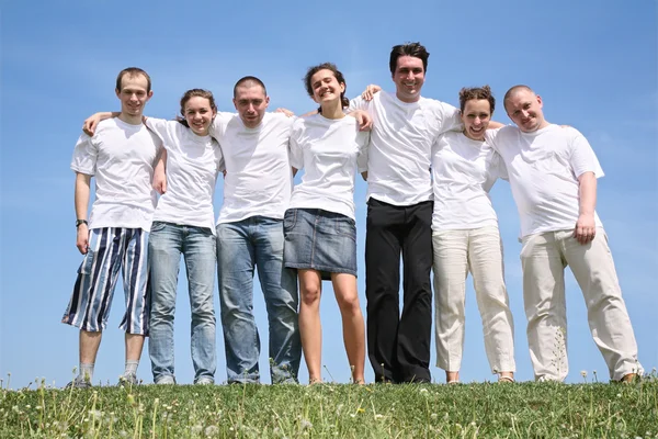 Stock image Group of friends in white T-shorts are beside