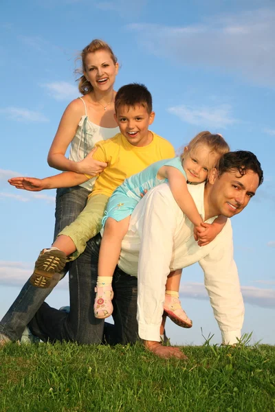 Playing family grass sky — Stock Photo, Image