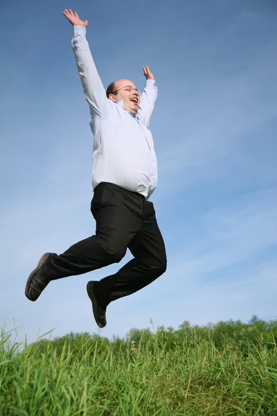 Man jumping grass — Stock Photo, Image