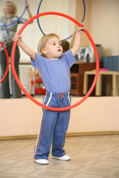 Baby play with hoop — Stock Photo, Image