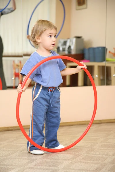 Baby with hoop — Stock Photo, Image