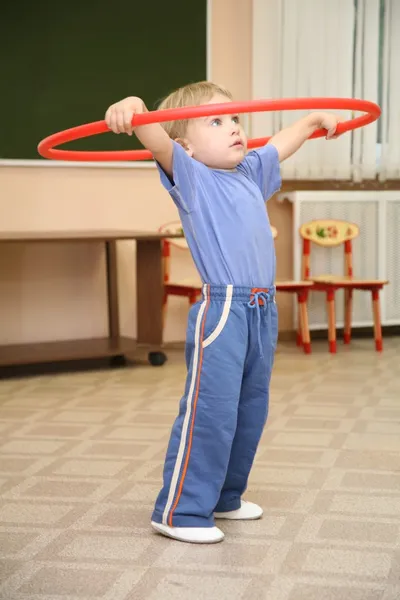 Little girl play with hoop 2 — Stock Photo, Image