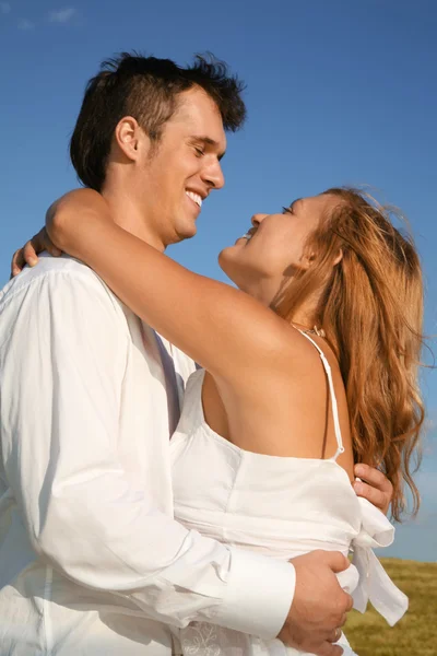 Man and woman embrace each other — Stock Photo, Image