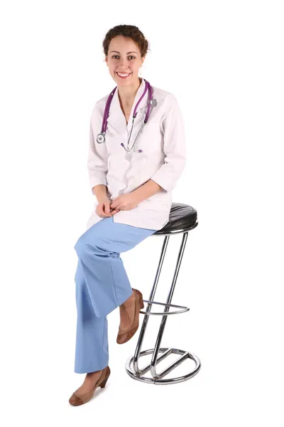 Doktor mujer sentarse en el taburete de la barra —  Fotos de Stock