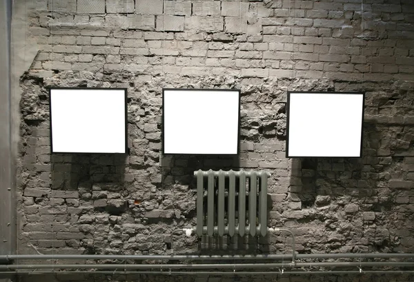 Frames on the bricks wall — Stock Photo, Image