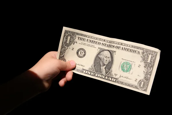 Hand and one dollar isolated on black backgrounds — Stock Photo, Image