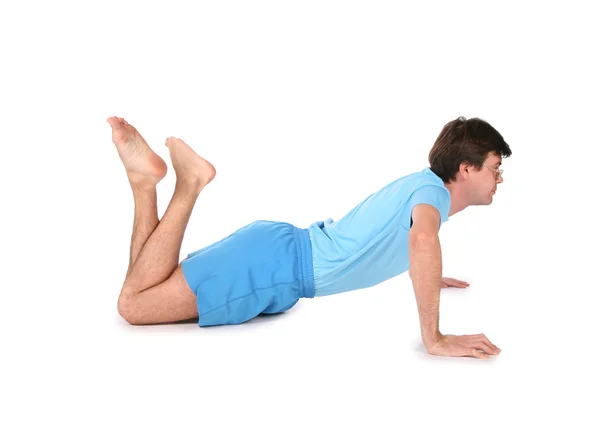 Uomo yoga sul pavimento — Foto Stock