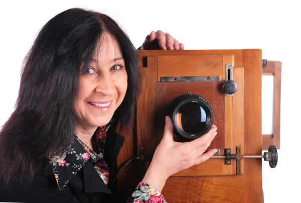 Mulher sênior com câmera velha — Fotografia de Stock