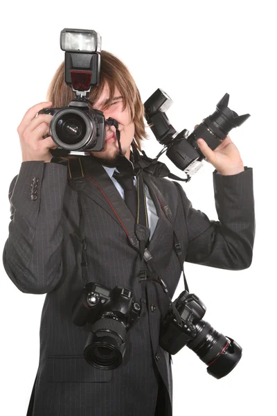Young man with four cameras — Stock Photo, Image