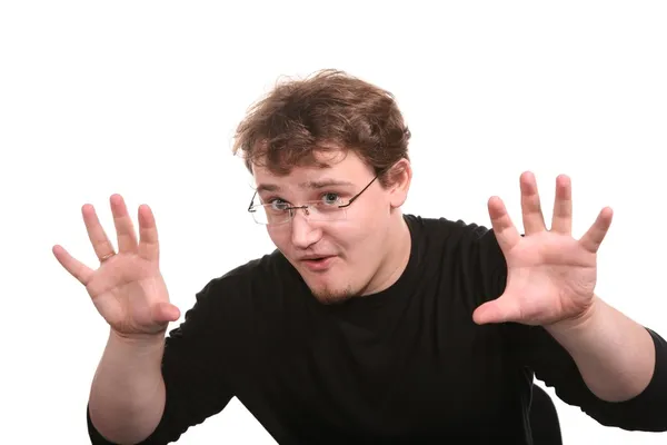 Jonge man toont gebaren door de handen — Stockfoto