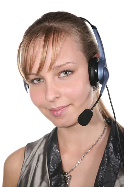 Mladá žena v headsetu — Stock fotografie