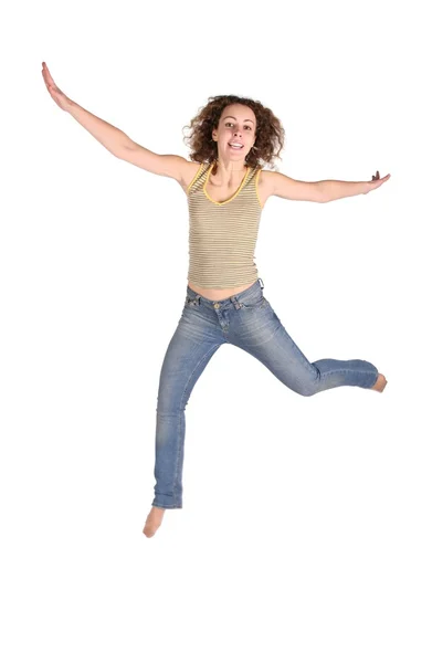 Genç güzel kadın atlama üzerinde beyaz izole — Stok fotoğraf