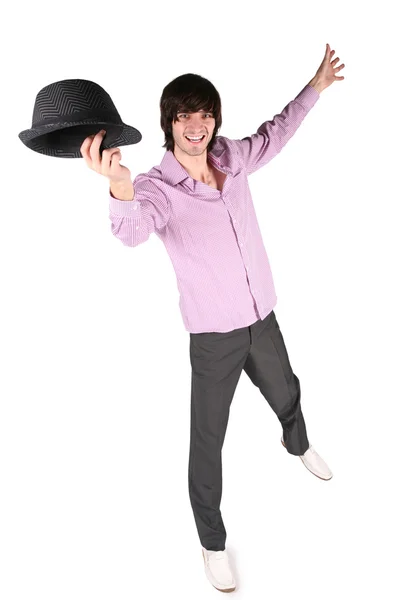 Молодий чоловік з чорним капелюхом у твоїй руці на білому 2 — стокове фото