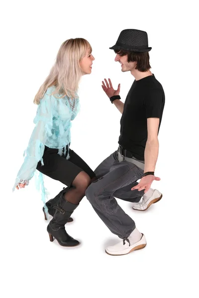 Ragazzo in cappello nero danza con ragazza in camicetta ciano su bianco 2 — Foto Stock