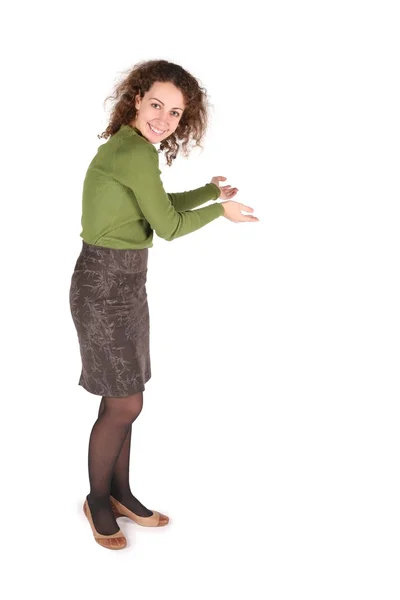 Young woman does welcome gesture on white — Stock Photo, Image