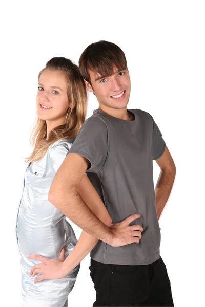 Teenager couple stand back to back on white — Stock Photo, Image