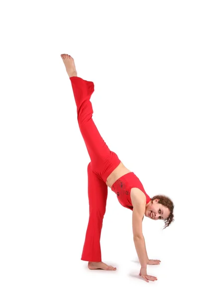 Sport mladá žena udělat gymnastika izolované na bílém — Stock fotografie