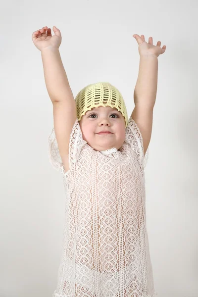 Criança com as mãos para cima — Fotografia de Stock