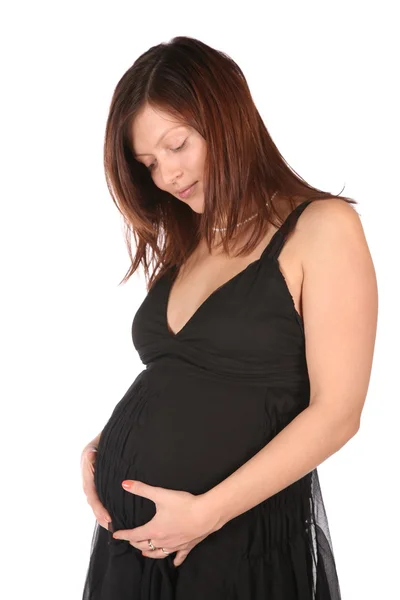 Ragazza incinta abbraccia pancia 2 — Foto Stock