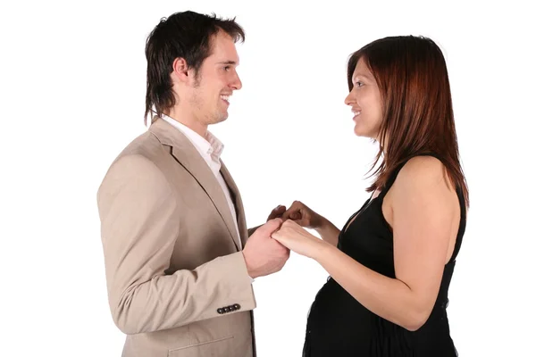 Pregnant couple face-to-face — Stock Photo, Image
