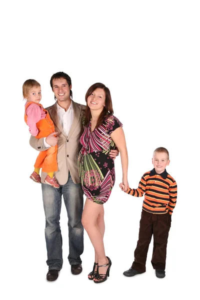 Junge schwangere Familie mit Kindern — Stockfoto