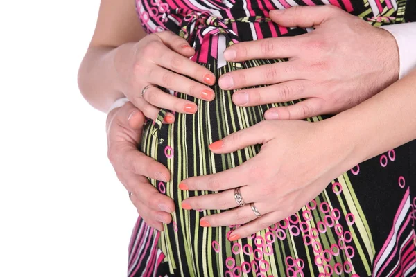 Χέρια που αγκαλιάζουν έγκυος κοιλιά — Φωτογραφία Αρχείου