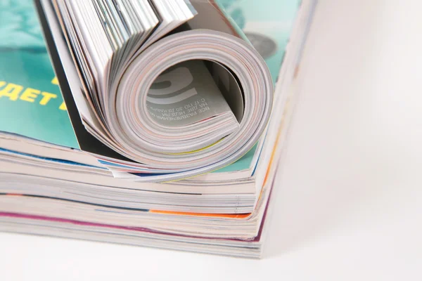 Curled magazined on stack — Stock Photo, Image