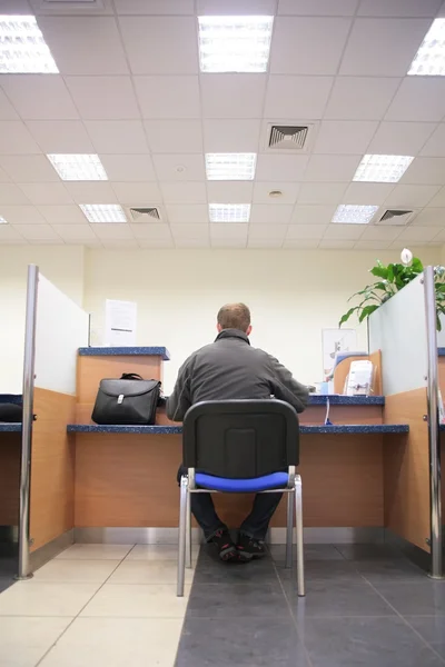 Man in bank office — Stock Photo, Image