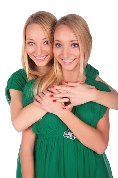 Twin meisjes één achter — Stockfoto