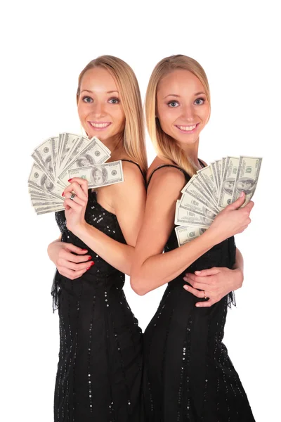 Meninas gêmeas com dólares — Fotografia de Stock