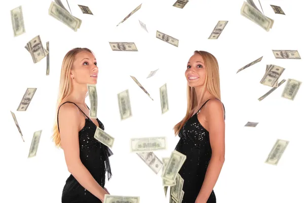 Twin gilrs ser på fallande dollar — Stockfoto