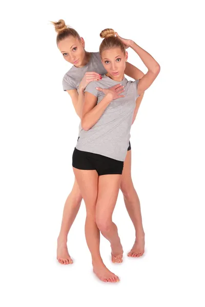 Twin esporte meninas posando — Fotografia de Stock
