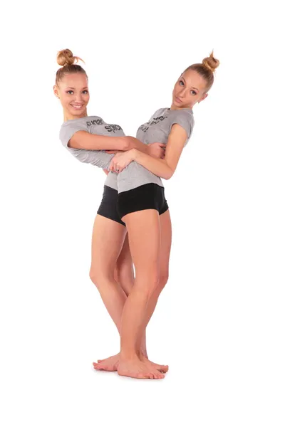 Twin sport girls stands — Stock Photo, Image
