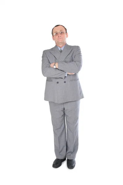 Man i grå kostym står — Stockfoto