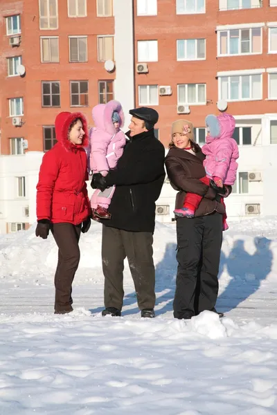 Two yuong woman and grandfather with children on the walk in the winter 2 — Stock Photo, Image