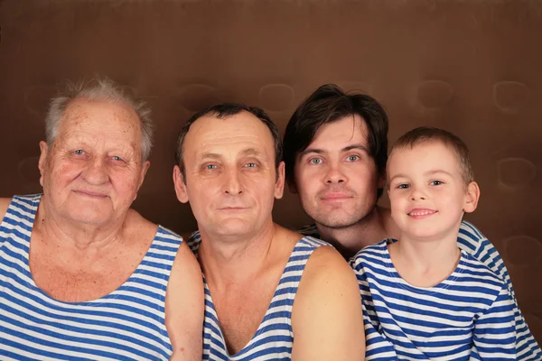 Four generations in frocks — Stock Photo, Image