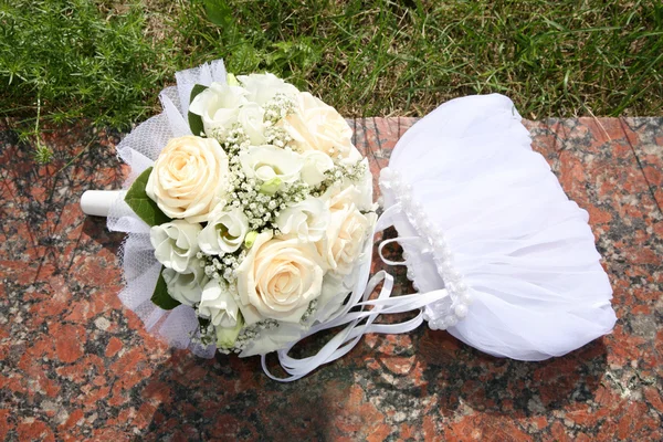 Bag and the bouquet of the bride Royalty Free Stock Photos