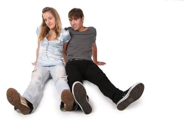 Teenager couple sit on white 3 — Stock Photo, Image