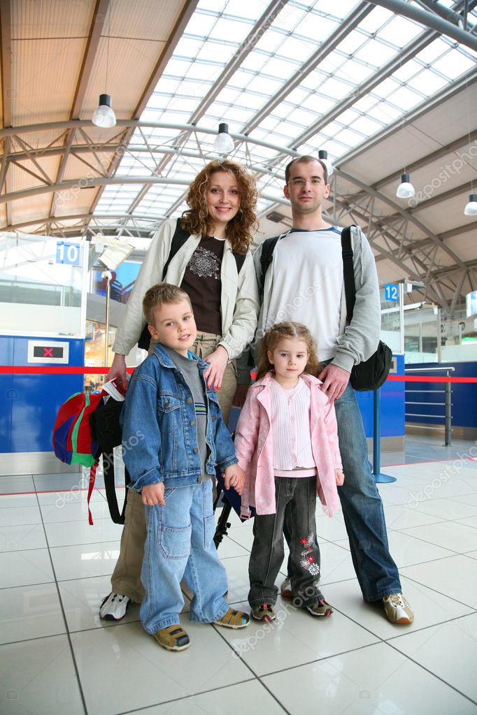 Standing traveling family of four