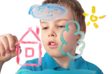 Boy paints house on glass clipart