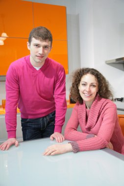 Young couple on kitchen