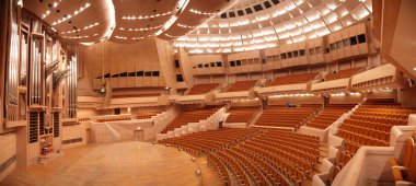 Panorama of empty concert hall with organ clipart