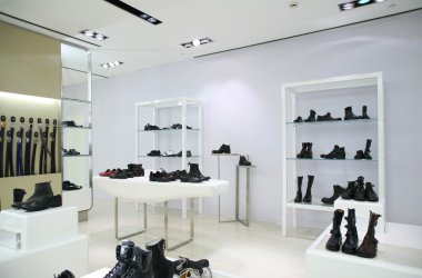 Division of store with foot-wear and belts clipart