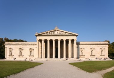 Facade of house with columns clipart