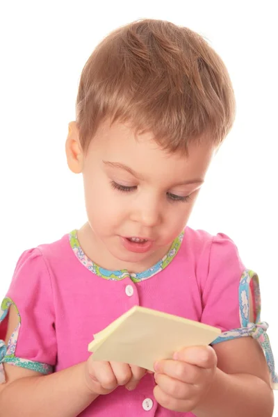 Dziecko z etykiety papier — Zdjęcie stockowe