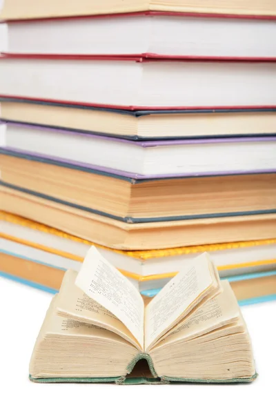 Big stack of books and opened small book 2 — Stock Photo, Image