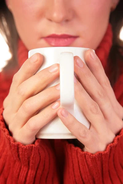 Young woman with cup in hands — Stock Photo, Image