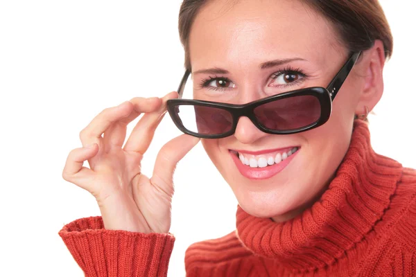 Pretty woman in dark glasses and red sweater — Stock Photo, Image