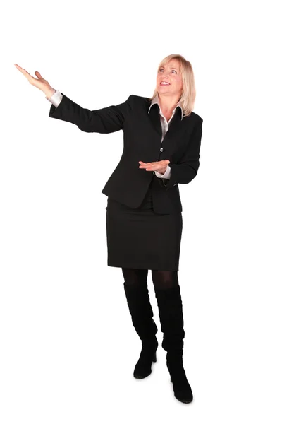 Middleaged businesswoman shows... — Stock Photo, Image