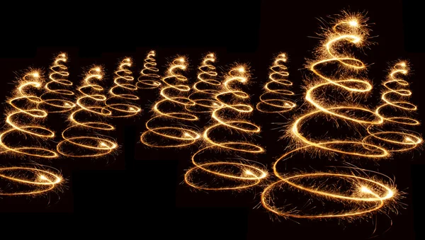 Espiral de árvores de natal cintilantes — Fotografia de Stock
